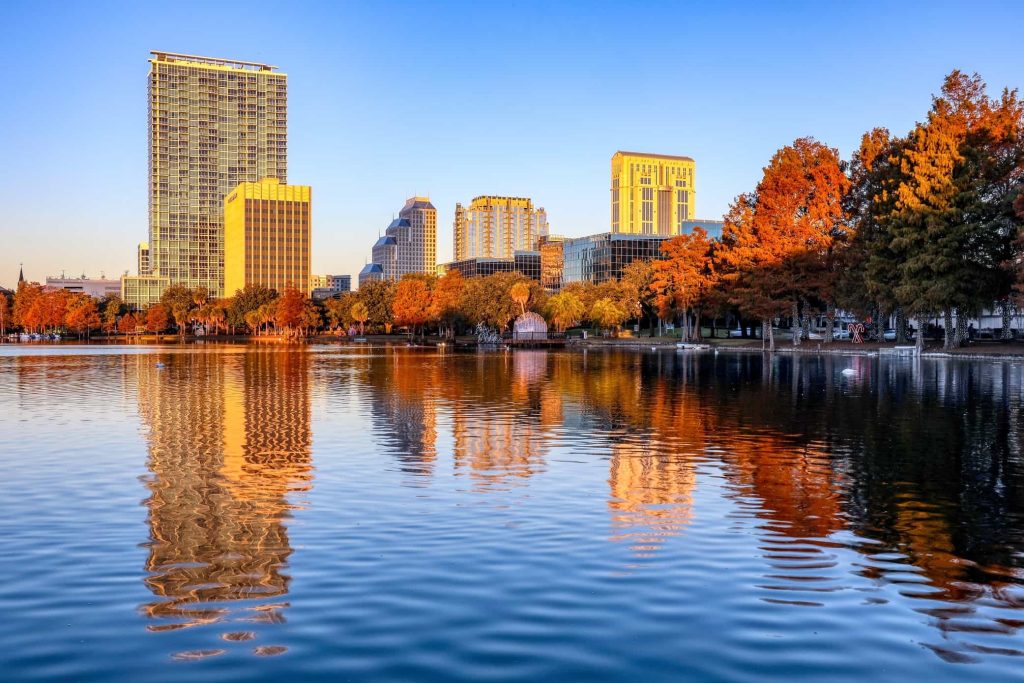 picture of lake eola with downtown buildings as it is today